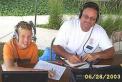 Austin KC9DEL and his dad Sam KA9VHQ work 40M together during Field Day 2003. Photo by WD9EED