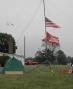 A verticle antenna mast makes a good place to display "Old Glory" and the ARRL colors