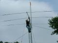 The A3S going up on the tower. Yeah, that's W5UGD up there. Note the sky. (Don't do this at home kids. Rain/Lightning and metal structures do not mix! SAFTEY FIRST)
