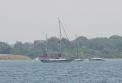 45' cutter-rigged ketch Bellerophon on anchor in Potter Cove off Prudence Island at approximately 41 38.12 N by 071 19.7 W.