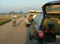 The NLRS Rover Pack parked on rural road in SW Minnesota. To the left in the photo is W9FZ looking for contacts to the East.  To the right (his back to the camera) is WB0LJC.  Closest to the camera is the open rear compartment of the W0JT rovermobile.