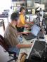 W8RZ running on 40 m (left) and AF8A scanning for multipliers (right) at the Case Western Reserve University club station, W8EDU.  (W8WTS photo)