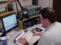 Station owner Mike KØFJ enjoys the technological side of maintaining a modern RTTY ham station, and is a skilled runner as well.