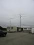 Photo #1 - The station with 144MHz, 432MHz, 902MHz and 1296MHz antennas on the tower and 50MHz on the rear of the RV.