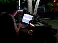 KB5YLG David operating PSK31 at night.  Photo by Richard K5ANR.