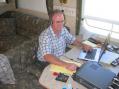 Guy, N7YRT, PARC President, running 40 meter CW from his travel trailer after the bugs got too intense at night.