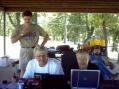 Shown in the picture are:  Jim Harmon, K5BNK, (standing); David
Booth, K5YM; Ken Eppler, AB5CC, and Darrell Bond, KE5IGA, 
(Seated left to right)
Picture by Joe White, K5BQG, DARA PIO