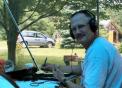 KA1ZQX, Tim Bell, pauses during the heat of the battle for a photo op.