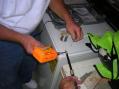 Phillip - AF4NP - gets things started by soldering a PL-259 on a coax.