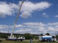 90 foot crane with antenna.