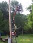 Tim K8IAT cutting away wire-ty's to allow the beam to turn