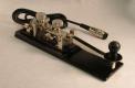 Danish Amplidan Professional Marine Telegrapher's Key used on ocean-going vessels and at KB4T. It's long arm and great heft make it a stable and well-balanced key that is easy to use even for long periods.  