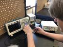 Student building a circuit board