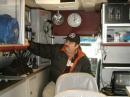 <b>2009 KENTUCKY ARES CONFERENCE.</b> Charlie Cantrill, KI4RDT, operates at the HF station in MC-1, Nelson County's mobile command post. The unit is equipped with HF and VHF ham gear, as well as commercial VHF and UHF equipment and an onboard mobile repeater.