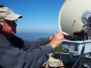 Gregory Drzyzga, NA4N, of Amissville, Virginia, operates in the 2010 ARRL 10 GHz and Up Contest. [Photo courtesy of Gregory Drzyzga, NA4N]