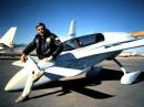 Dick Rutan, KB6LQS, with his airplane. [Photo courtesy Dick Rutan/Facebook}