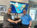 Geochron Owner Patrick Bolan (left) was thanked by ARRL Director of Operations Bob Naumann, W5OV (right) for the donation of a Geochron Atlas 2 4K to ARRL. The device was installed at W1AW. [Bob Inderbitzen, NQ1R, photo]