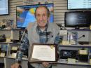 Paul Szczerbinski, W9KHO, with his award.