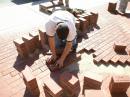 Bob Antonello, Jr places new bricks in the ARRL Diamond Terrace. [S. Khrystyne Keane, K1SFA, Photo]