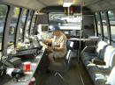 Here is Buddy again, this time in the command bus, keeping score while the operators take a break.

