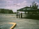 The three of us next to the 3 element Yagi on a push up pole attached to the Car Wash canopy on the roof of the parking gargage at about 60 feet.