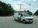 FM19 in parking lot of the Army Reserve. 5/10G dishes unmounted as lots of trees in this spot. Attracted troops interested in what was happening and my brochure on ham radio and roving was useful. 