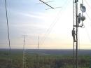 N2CEI and W2PED working on the microwave tower before the contest began. The 144 Array is visible to the left a few hundred feet away. The top six meter beam is barely visible below in the foreground. The view is Southwest.