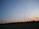 A view of the south and middle towers at sunset.  20M dipole visible with one end of the 40M dipole on the right edge.