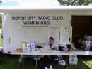 N8ZLM tending the information booth. The new club equipment trailer serves very well for the booth.