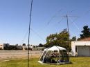 Operations tent with 10/15 Meter Buddiepole and 20 Meter Yagi.