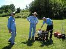 Wayne KD7NJW, Bill KF7PB, and Carter W7IAG fueling the generator.