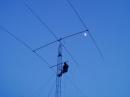 Ken Boyd, K4DXA, climbed our temporary tower by the light of a "Carolina Moon" to install a trapped 75m/40m dipole for Saturday evening's operation. 