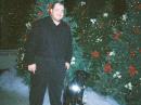 Christmas 2004 picture of myself and my "K9 Wingman" Leader Dog Patriot taken in the University Union at Western Illinois University