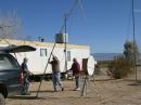 Dennis WA6NIA raises the big Yagi for 2m, Rich KG6JKJ handles the hardline and Jim WA6TFZ supervises.