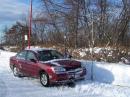 Here is WB2AMU's single operator VHF setup at a hill in Suffolk County, just hours after a major blizzard.  The three element Two Meter Yagi is mounted in an umbrella stand in front of the car and a two element Six Meter Yagi is hanging in the trees at the side of the car.