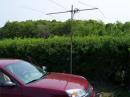 Here is WB2AMU's portable Six Meter setup during the June VHF contest, using a three-element Yagi on an umbrella stand at one of the higher hills of Long Island.