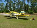 KA4AXS during Field Day 05 at Dog Island, FL.  A beach umbrella was secured against the fuselage for shade.