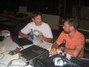 Kurt, N4CVF, shows a newly upgraded ham visitor the ropes on 20m SSB Saturday evening.