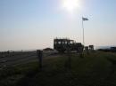 The sun over Narragansett Bay looked hot, but notice the nice breeze as indicated by the flag.