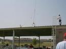 The park's pavilion makes an excellent ground plane for our homemade 40m vertical (made from electrical conduit). It's a full quarter wave on 40m! Visible up on the roof are John AC5CV, Ed KC5NT, and Hurshel WB5MEX. Bill KD5UEW is supervising from ground level.