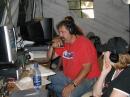 Roger VE7NAP works 20 sideband on his 745 while Melanie (sister of Tracy VE7RZ SK) looks on