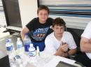 The GOTA station with two of the youth participants.