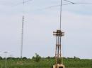 40M Heard Island special on a forklift.  In the corn field is a 67' tall vertical used on 80M with 8 - 1/4wL radials.