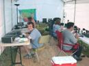 The Crew, hard at work on the bands.  Back L-R: Charlie N0AKC, Mary KC9FVS. Front L-R:  David KB9SGY, Darrell K9AIH.