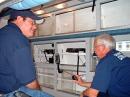 KG4HXN(left) and KI4KOW (right) doing an APRS demo in the Civil Defense Mobile EOC