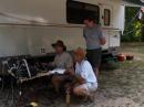 Jerry, KK5CA, operates the digital station while Alan, KB2WF, and Dan, N1END look on.