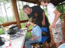 Don (KG4WQO) working with youth to make thier first ever radio contact.