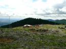 The best home a ham could have.  Two towers and a Butternut vertical cover 80 meters through 432 MHz.  Add plenty of generator fuel, sumptuous Field Day food and a fabulous view and you have the stuff of which <i>Ham Dreams</i> are made!