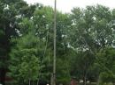 Ron-KD4XA, Mike-K4RKO, Shelton-KG4ZIL, Tom-KD4CMK, and Anthony-KG4YXP have fun putting the "rocket launcher" antenna mast together.
