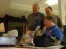 Don--W4ZYT demonstrates his brass pounding skills to Fred--K4LJF and Anthony--KG4YXP